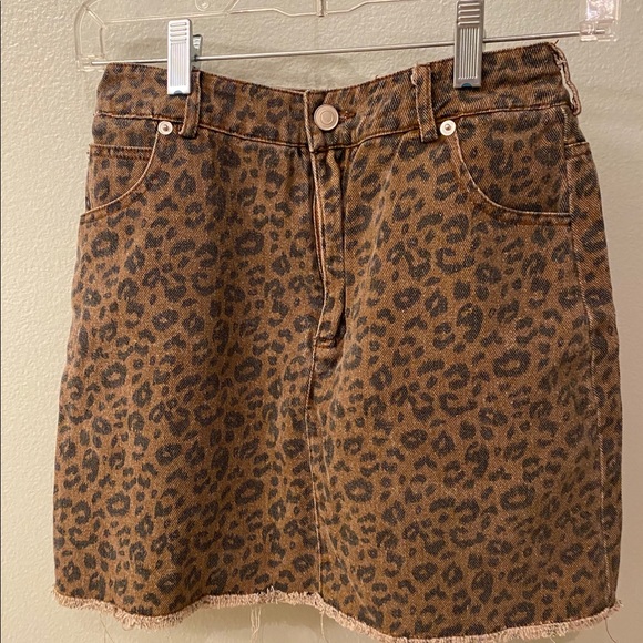 Isabelle’s Cabinet- Cheetah Mini Denim Skirt - Picture 1 of 3